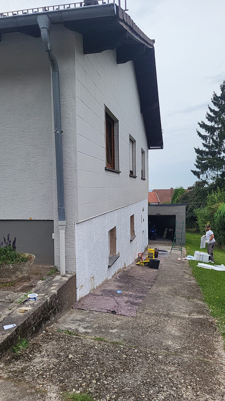 Referenz: Arbeiten an einer gedämmten Fassade